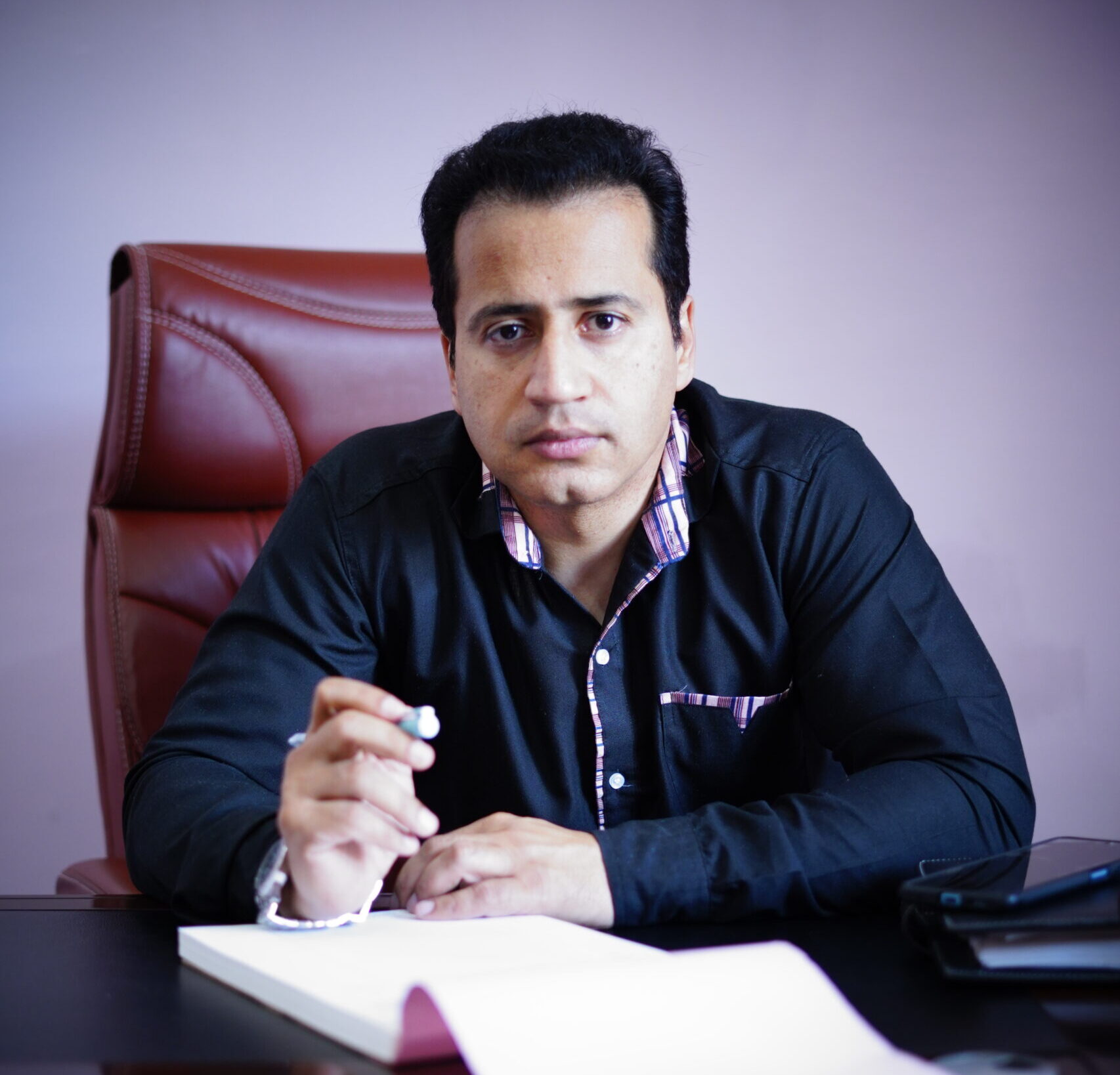 Dr. Shah Naveed